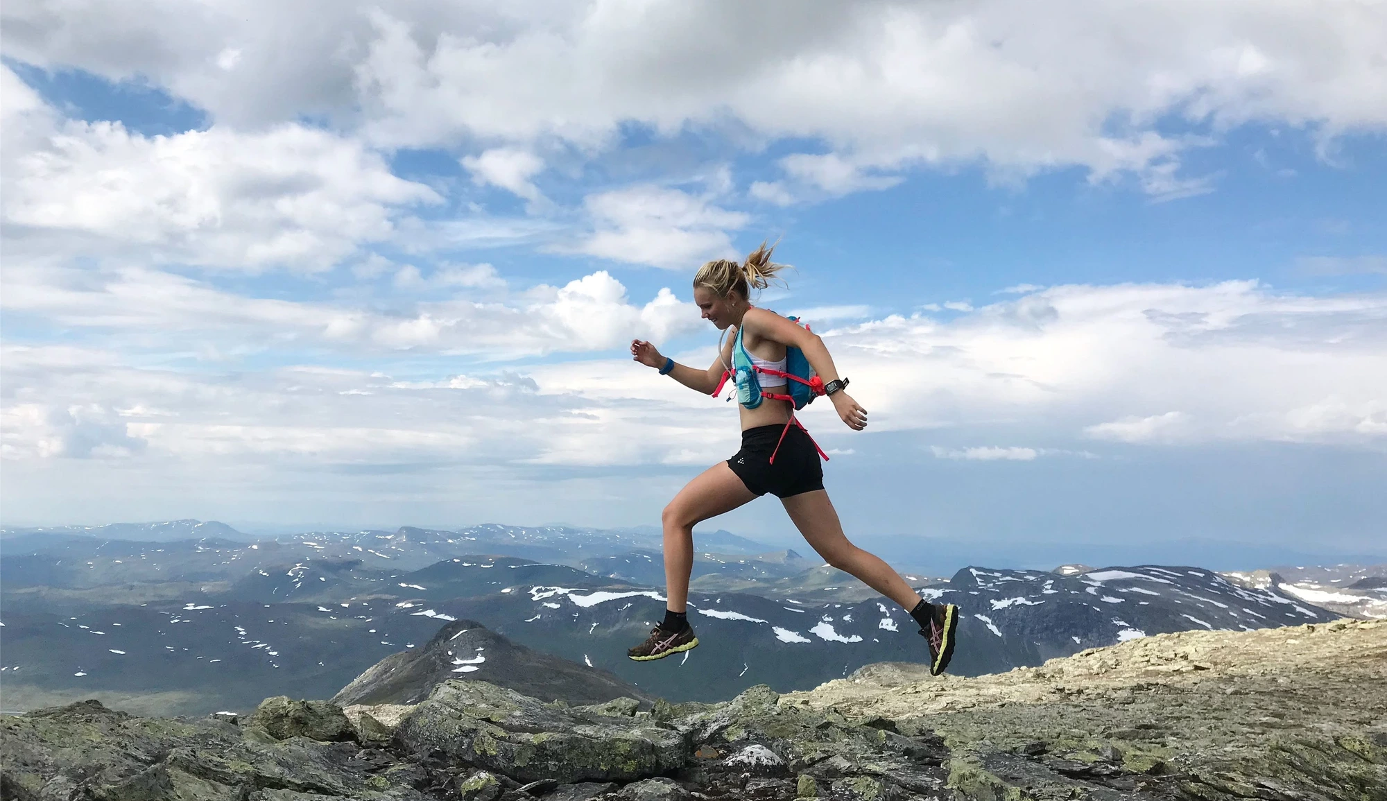 Woman running in the mountains